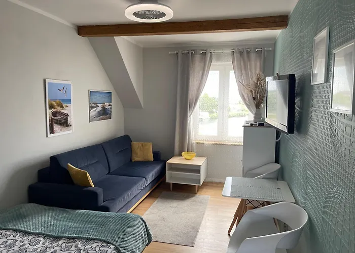 Pod Papugami - Komfortowe pokoje z widokiem na rzekę Łeba